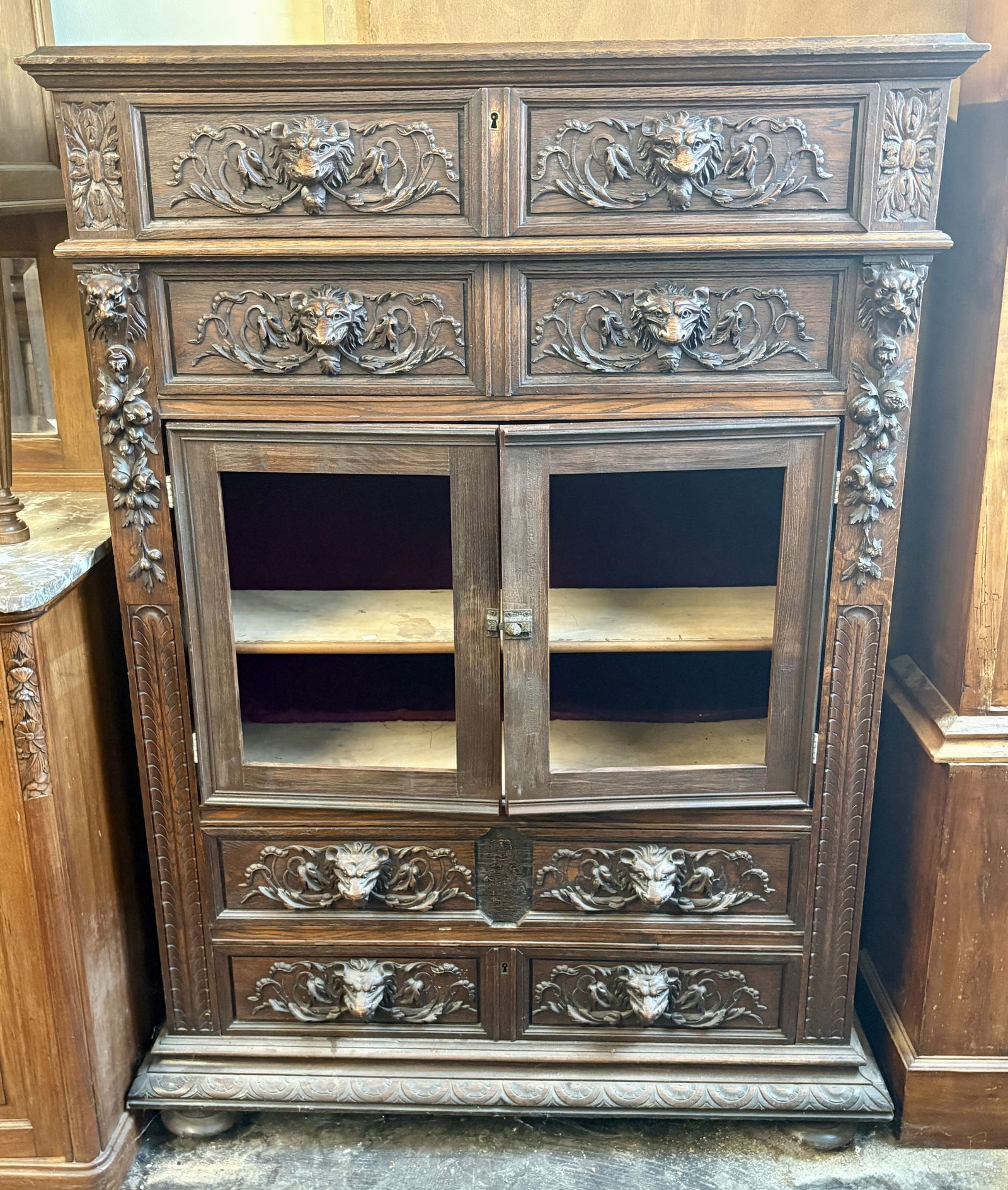 17th-century Bruges Cabinet Crafted from Solid Oak featuring Deeply Carved Lion Motifs on Drawers (1 of 9)