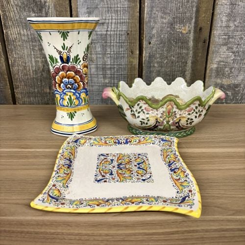 The Lot Of Vintage Pottery Includes a Hand-Painted Ceramic Vase from the Netherlands, traditionally: The Lot Of Vintage Pottery Includes a Hand-Painted Ceramic Vase from the Netherlands, traditionally known as Delftware, a Decorative Square Wavy Edge Plate made by Meridiana Ceramiche in Italy - 9", 7