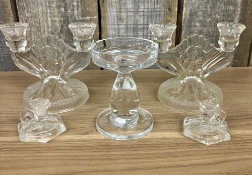These vintage clear glass candle holders feature a design by Krosno, specifically including a 5-inch: These vintage clear glass candle holders feature a design by Krosno, specifically including a 5-inch tall pillar candle holder made in Poland - 6"x6