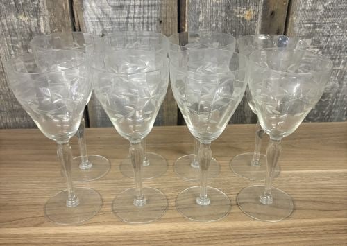 These Vintage Etched Crystal Wine Glasses feature an Intricate Floral or Leaf Pattern and are Likely: These Vintage Etched Crystal Wine Glasses feature an Intricate Floral or Leaf Pattern and are Likely from the Mid-Century Era - 3.5"x8"