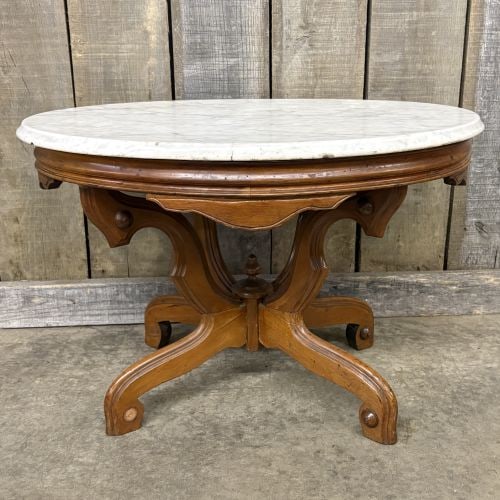 Antique Victorian-Style Table featuring an Oval White Marble Top and a Carved Wooden Base -: Antique Victorian-Style Table featuring an Oval White Marble Top and a Carved Wooden Base - 22"x29"x20" - NOT AVAILABLE FOR SHIPPING, PICK UP OR TRANSPORT ONLY