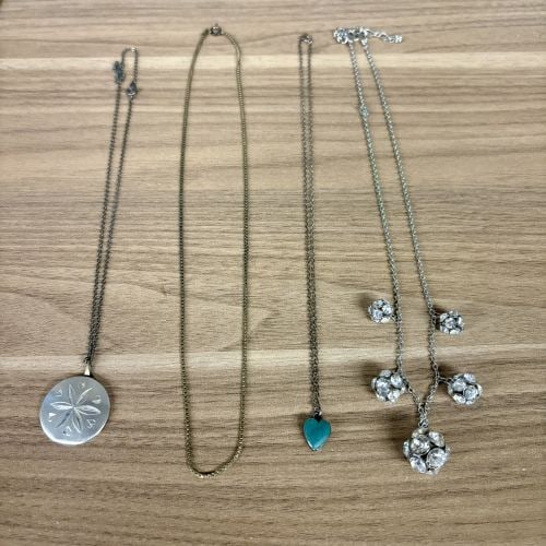 Collection of Various Necklaces, including a Sterling Silver Sand Dollar Pendant and a: Collection of Various Necklaces, including a Sterling Silver Sand Dollar Pendant and a Turquoise-style Heart Medallion Necklace - 20"