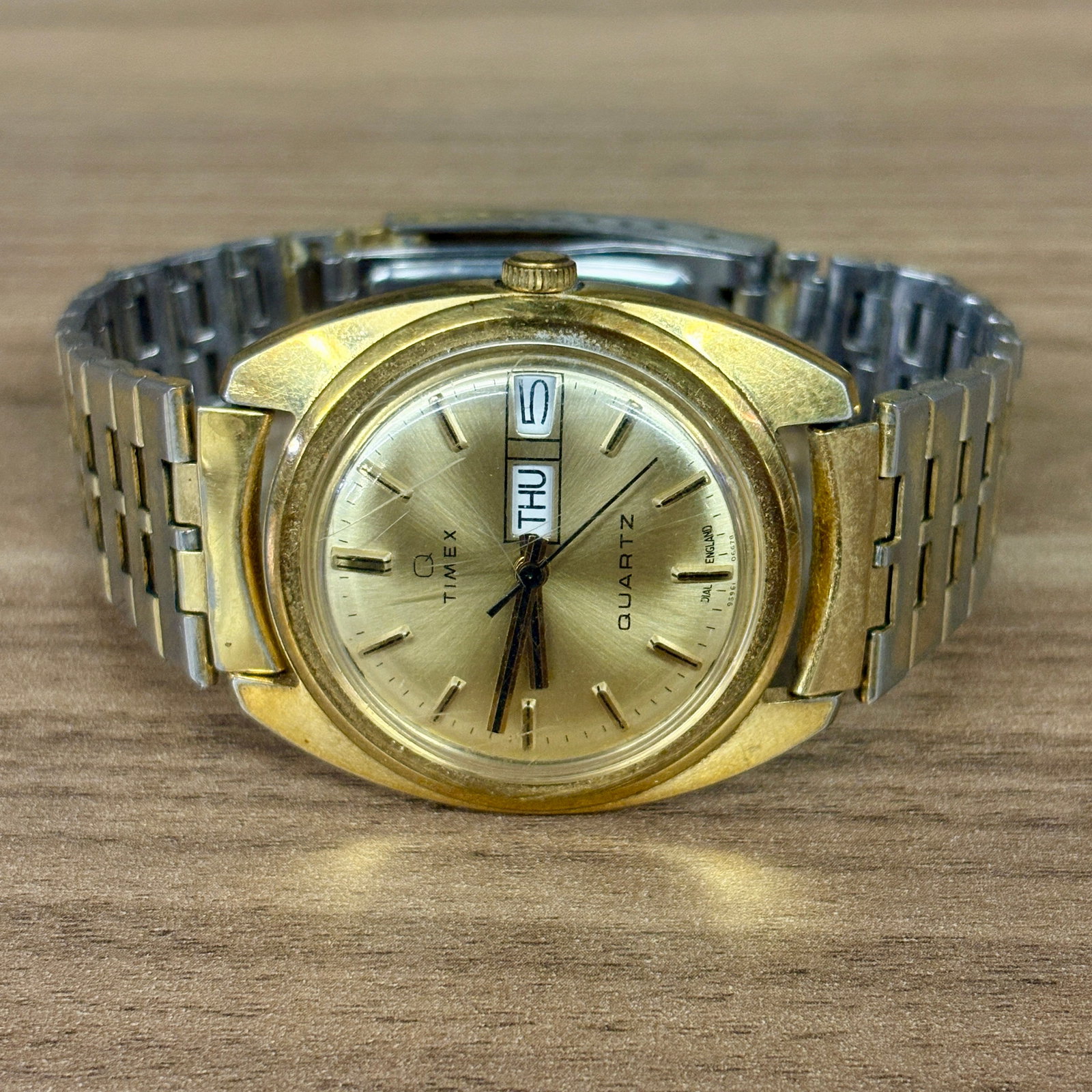 Vintage Timex Q Quartz watch from the late 1970s, specifically featuring a "tonneau" (barrel-shaped) (1 of 5)