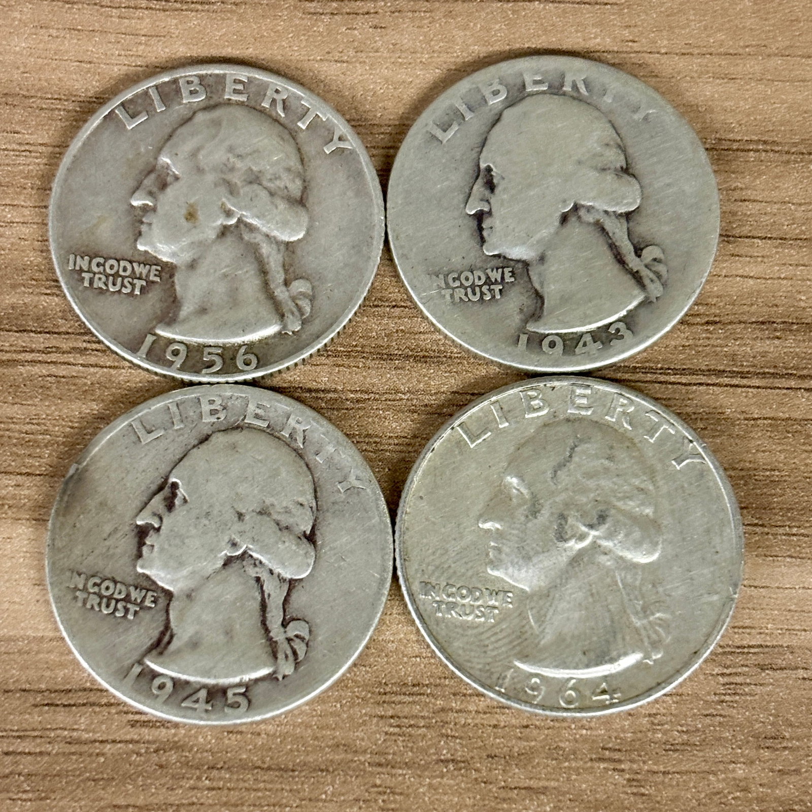 Four (4) Silver Quarters: 1943, 1945, 1956, 1964 - 1" (1 of 2)
