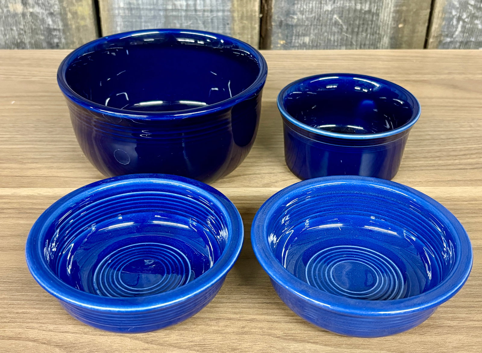 Four Pieces of Fiesta Dinnerware in two distinct, classic shades of blue, Twilight or Cobalt and (1 of 5)