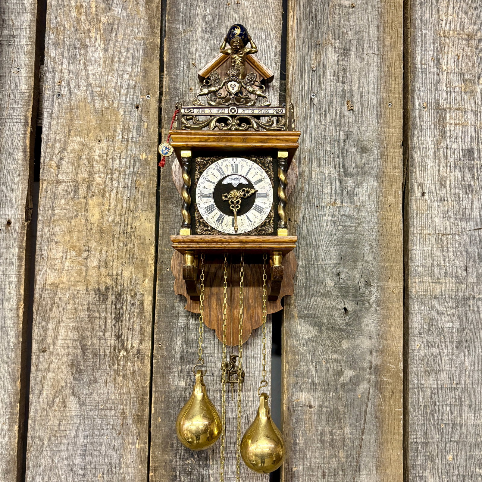 Vintage Dutch Zaanse wall clock, a decorative weight-driven timepiece crafted in the mid-20th (1 of 9)