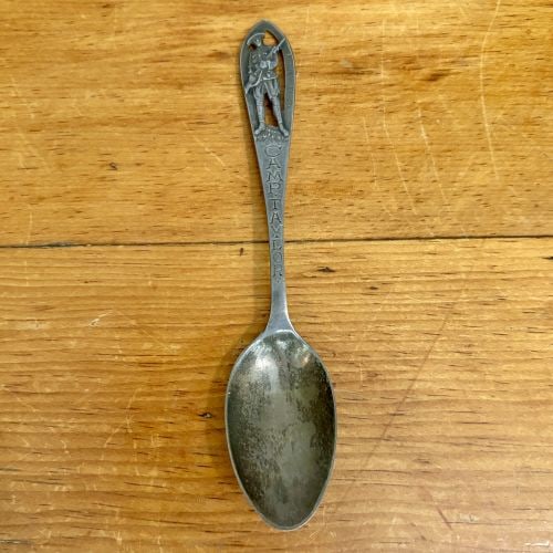 World War I Sterling Silver Souvenir Spoon by George L. Paine Co Camp Zachary Taylor Louisville: This World War I era souvenir spoon is manufactured from sterling silver and commemorates Camp Zachary Taylor in Louisville, Kentucky. The handle terminal features a pierced, die-cut silhouette of a U