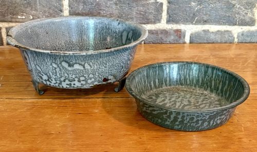 Two Pieces of Vintage Grey Mottled Graniteware Kitchenware 8"X8"X4": This lot consists of two pieces of vintage grey mottled enamelware, also known as graniteware or agateware. The collection includes one footed colander and one small basin. The colander features a cir