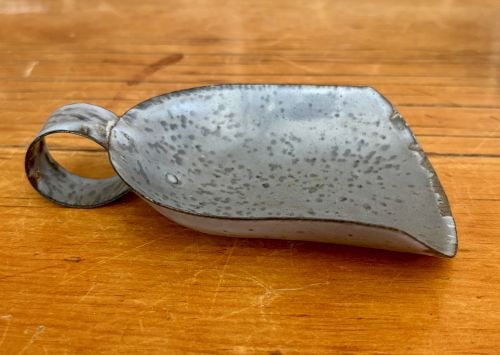 Two-Piece Antique Mottled Grey Graniteware Wall-Mounted Box and Scoop Set 3.5"X5"X7": This two-piece set of American kitchenalia from the late 19th to early 20th century consists of a wall-mounted container and a matching hand-held scoop. The items are constructed of stamped base metal