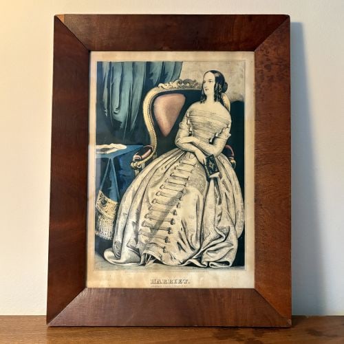 Nathaniel Currier Hand-Colored Lithograph, Harriet, 1845 13"X17": A hand-colored lithograph portrait titled Harriet, published by Nathaniel Currier in 1845. The print depicts a young woman in mid-19th-century formal attire, seated in a carved armchair with red uphol