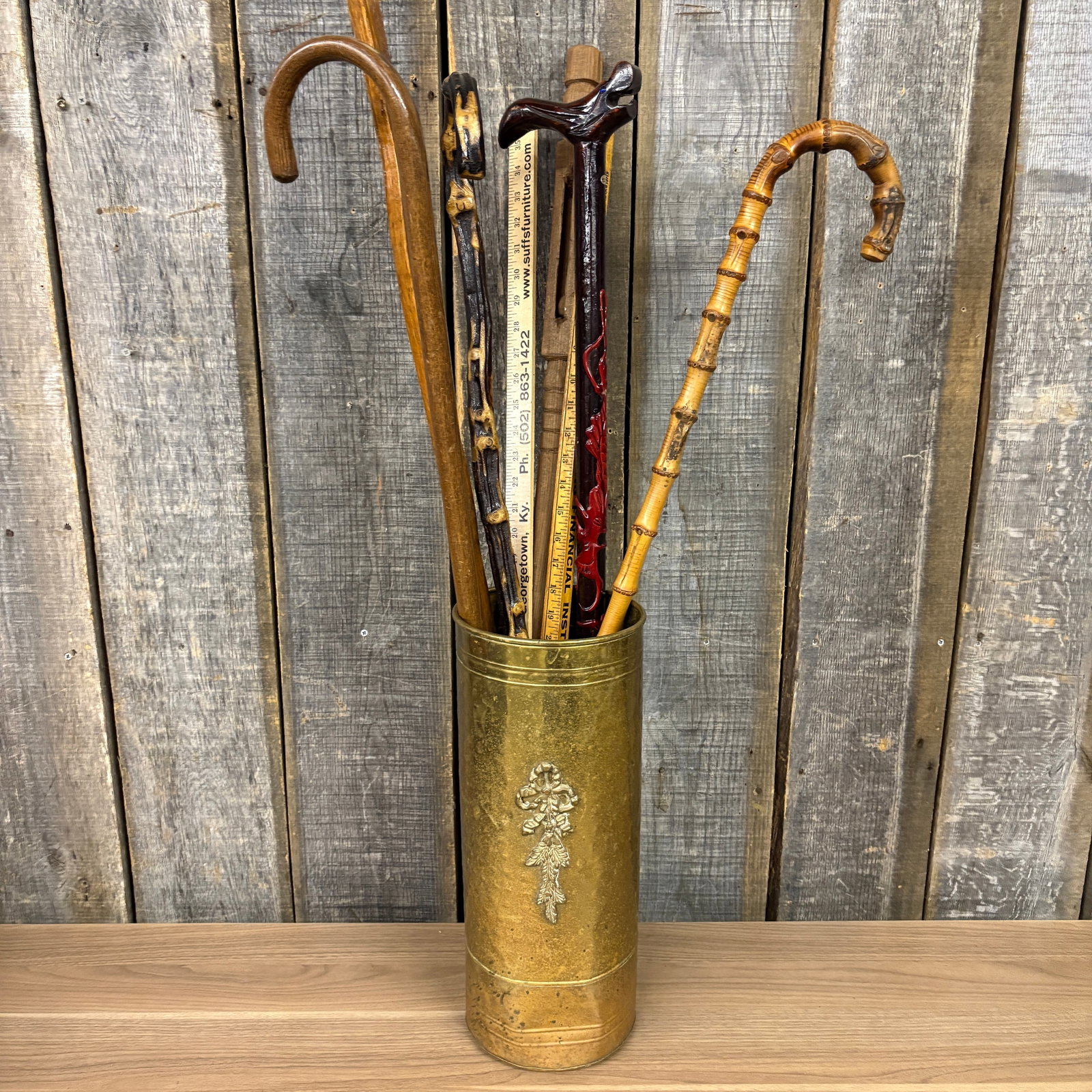 An Assortment of Vintage Walking Canes and Advertising Yardsticks in a Brass Stand 8"X46" (1 of 7)