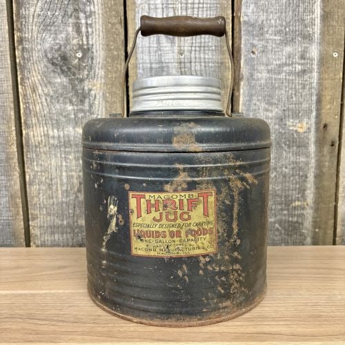 Vintage Macomb Thrift Jug One Gallon Metal and Ceramic Insulated Thermos: This is a vintage one-gallon insulated utility jug manufactured by the Macomb Manufacturing Company of Macomb, Illinois. Known as the Thrift Jug, this model was designed for the transport of both liqu