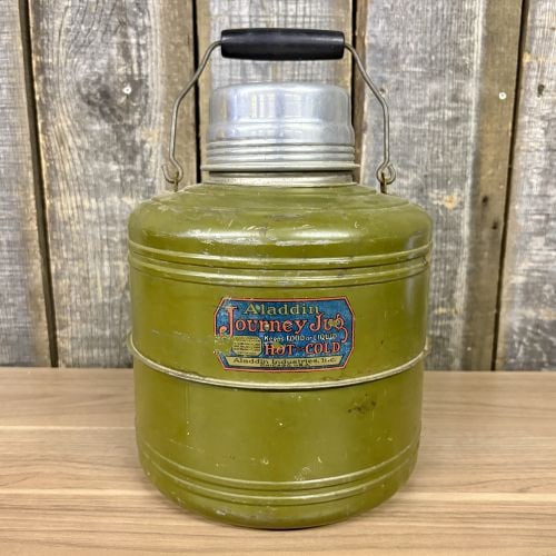 Vintage Aladdin Journey Jug with Ceramic Liner: This is a vintage Aladdin Journey Jug, a heavy-duty insulated thermal container manufactured by Aladdin Industries, Inc., in Chicago, U.S.A. The jug is constructed with a metal exterior shell finished