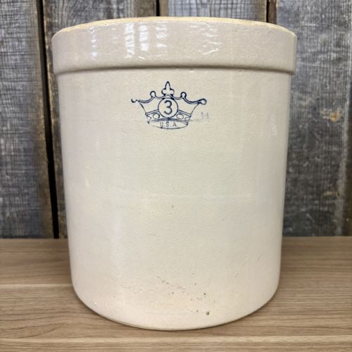 Robinson Ransbottom 3-Gallon Blue Crown Stoneware Crock: A 3-gallon cylindrical stoneware crock manufactured by the Robinson Ransbottom Pottery Co. of Roseville, Ohio. The exterior is finished in a light cream-colored Bristol-style glaze, while the interior