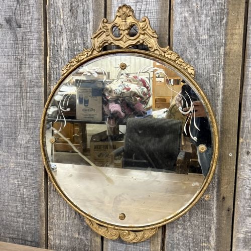 Wolf Blitz Rococo Revival Gilt Oval Wall Mirror with Etched Glass: This Rococo Revival style oval wall mirror features a molded gesso over wood frame with a gilt finish. The frame is designed with an elaborate pierced cresting that includes scrolling acanthus leaves,
