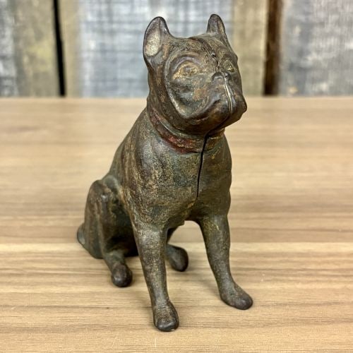 Antique Seated French Bulldog Still Bank Attributed to Hubley: This antique still bank is modeled as a seated French Bulldog or Boston Terrier dog, a design attributed to manufacturers such as Hubley or A.C. Williams from the early 20th century. The piece is made