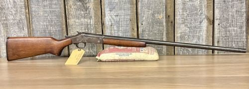Harrington & Richardson Topper Model 48 Break Action Shotgun 16 Gauge with 30 Inch Barrel 1949: This Harrington & Richardson Topper Model 48 is a single-shot, break-action shotgun chambered in 16 gauge, intended for general field use. The firearm features an approximately 30-inch blued steel bar