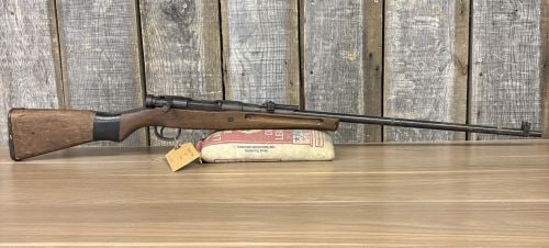 Japanese Arisaka Type 99 Bolt Action Rifle 7.7x58mm with 26 Inch Barrel: This is a Japanese Arisaka Type 99 bolt-action rifle chambered in 7.7x58mm, originally designed as a military service arm and currently presented in a sporterized configuration. The rifle features a 2