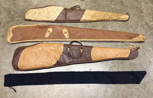 A Collection of Soft Gun Cases and a Protective Sleeve (1 of 3)