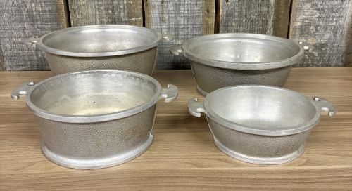 A Set of Four Graduated Cast Aluminum Nesting Bowls Attributed to Guardian Service Ware (1 of 10)