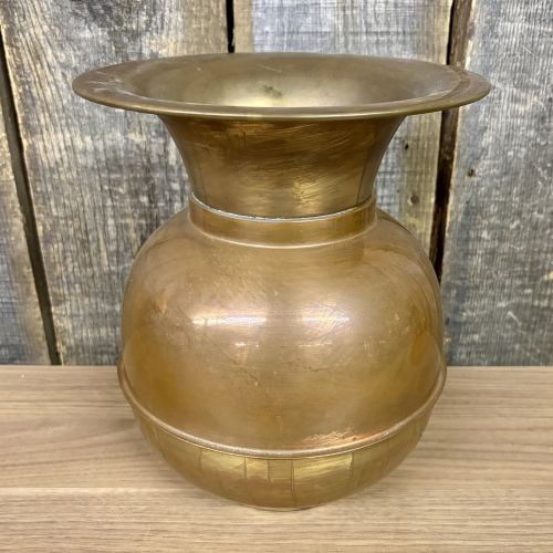 Vintage Copper and Brass Spittoon: A vintage mixed-metal spittoon or cuspidor featuring a three-part construction. The central bulbous section is crafted from copper and displays a raised horizontal center seam. The vessel transitions 