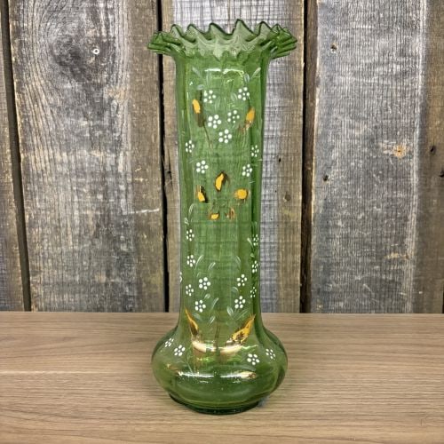 Antique Victorian Hand Blown Green Glass Vase with Enamel Floral Decoration: This Victorian-era art glass vase is hand-blown from transparent emerald green glass. The vessel features a wide, bulbous base that tapers into a tall, cylindrical body, finishing with a wide, ruffled