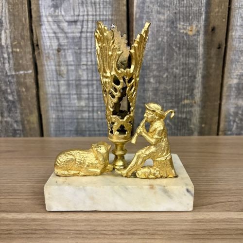 Victorian Style Gilt Metal Shepherd and Sheep Mantel Ornament on Marble Base: A 19th-century style decorative mantel ornament or spill holder, likely once part of a girandole garniture. The piece features a central, tall openwork element decorated with ornate scrolling foliage 