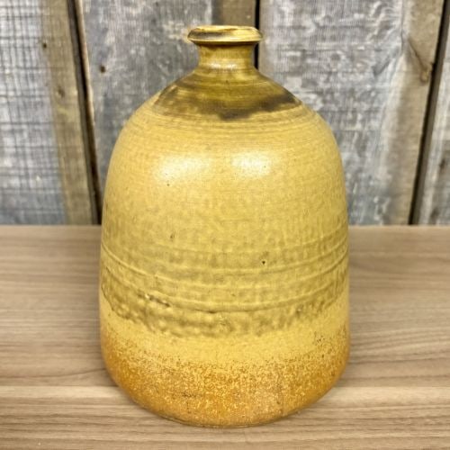 Studio Pottery Stoneware Beehive Vase in the Style of Rudi Stahl: A hand-thrown stoneware vessel of beehive form, characteristic of mid-century studio pottery. The piece features a wide, cylindrical body with a rounded shoulder and a narrow neck ending in a flared r