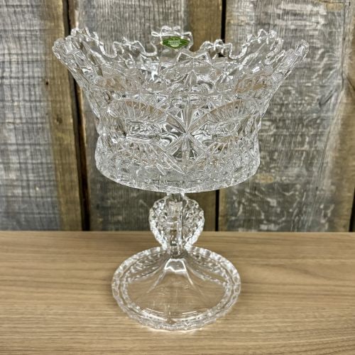 Two-Piece Shannon Crystal Pedestal Compote in the Royalty Pattern: This lot features a two-piece footed compote or punch bowl manufactured for Shannon Crystal, a line by Godinger. The set is composed of a deep, flared bowl and a separate matching pedestal base. Both 