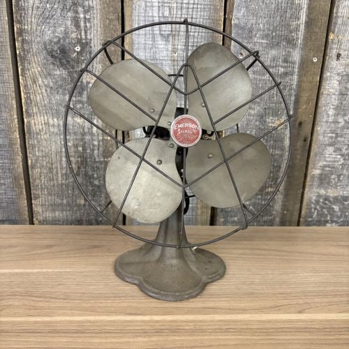 Vintage Emerson Junior Model 2650-C 10-Inch Oscillating Electric Desk Fan: This is an Emerson Junior model 2650-C oscillating desk fan, manufactured by the Emerson Electric Manufacturing Company in St. Louis, Missouri. The unit features four metal blades protected by a circu