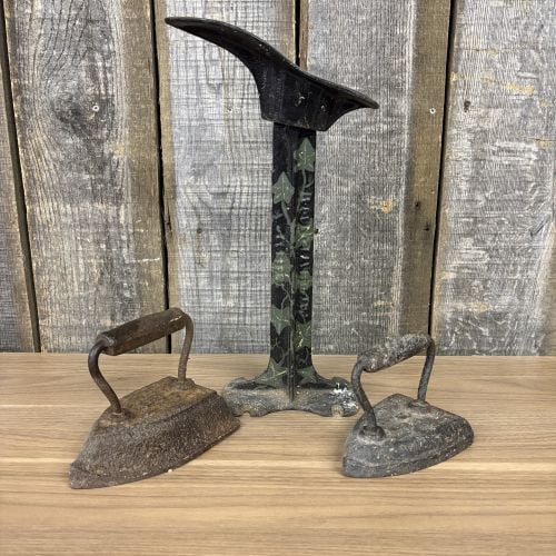 A Trio of Antique Cast Iron Items Including a Decorative Cobbler's Last Stand and Two Small Sad (1 of 5)