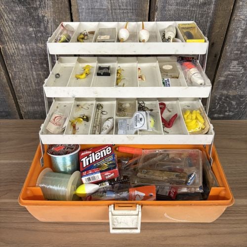 Adventurer Model 1499-5 Three-Tray Cantilever Tackle Box with Contents: This orange and white molded plastic cantilever tackle box is identified as an Adventurer brand, Model 1499-5, and is marked Made in U.S.A. on the front latch. The box features a three-tiered cantilev