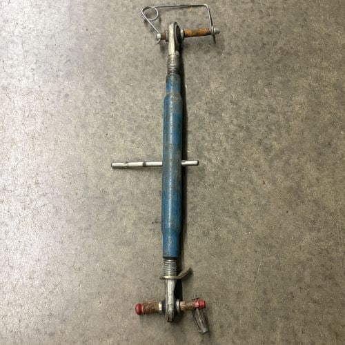 Adjustable Tractor 3-Point Hitch Top Link, Category 2: An adjustable tractor top link, a component of a three-point hitch system used for mounting and leveling implements. The assembly consists of a central barrel in a blue finish with a fixed handle for 