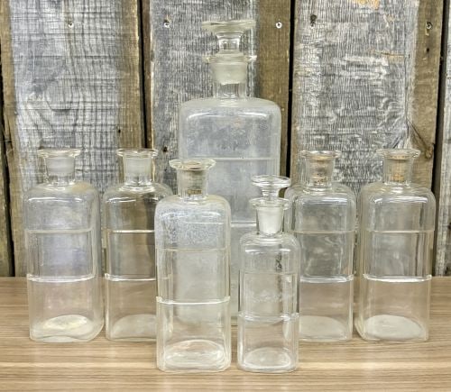 A Collection of Antique Clear Glass Apothecary Bottles Attributed to Whitall Tatum and Company (1 of 8)