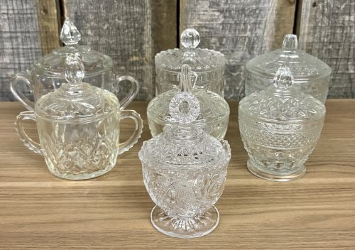 Seven Clear Glass Lidded Table Articles Including Pieces in the Style of Anchor Hocking Wexford (1 of 11)