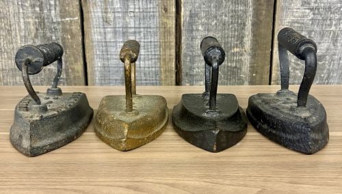 Set of Four Antique Cast Iron Sad Irons including Southern Queen Manufacturing Company (1 of 9)
