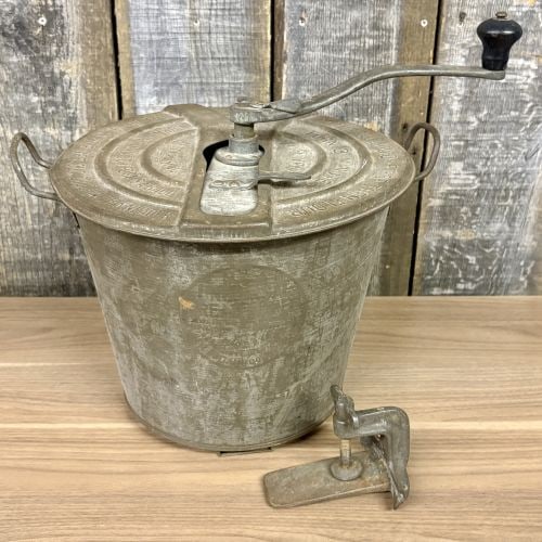 Antique Universal Bread Maker No. 4 by Landers, Frary and Clark: This antique Universal Bread Maker No. 4 is a hand-operated kitchen appliance manufactured by Landers, Frary and Clark in New Britain, Connecticut. The set is constructed of galvanized and cast metal 
