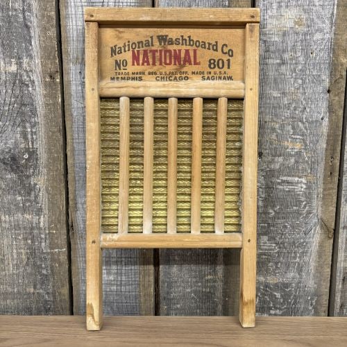 National Washboard Co. No. 801 National The Brass King Vintage Washboard: This is a vintage dual-sided washboard manufactured by the National Washboard Co. with production origins in Memphis, Chicago, and Saginaw. The piece is constructed with a solid wood frame and a corru