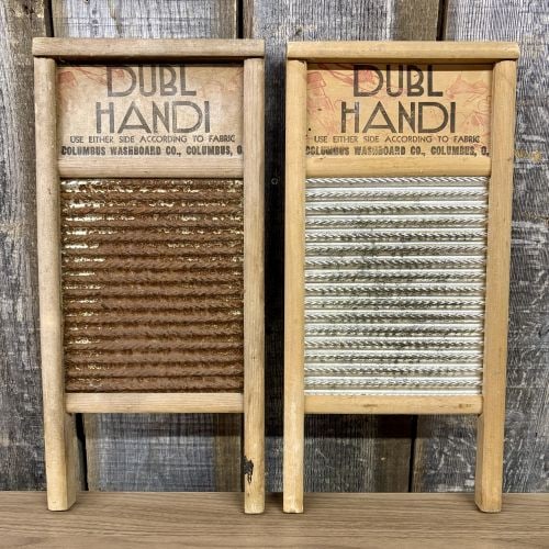 A Pair of Vintage Dubl Handi Travel-Sized Washboards by Columbus Washboard Co.: This lot features a pair of vintage travel-sized washboards, identified as the Dubl Handi model manufactured by the Columbus Washboard Co. of Columbus, Ohio. Each washboard is constructed with a solid