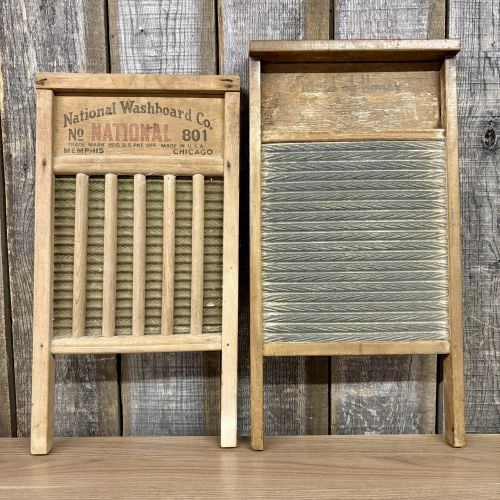 A Trio of Vintage American Wooden Washboards including National No. 801 and The Brass King: This collection consists of three vintage American washboards, each constructed with a wooden frame and unique scrubbing surfaces. The first item is a National Washboard Co. No. 801 model, which featu