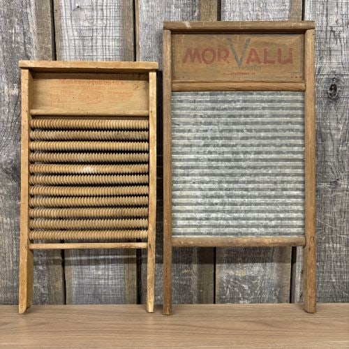 Two Vintage American Washboards including Mother Hubbard Roller and Morvalu Galvanized Models: This lot consists of two vintage laundry tools manufactured in the American Midwest. The first item is a Mother Hubbard Standard Roller Washboard produced by Mother Hubbard, Incorporated of Mendota, I
