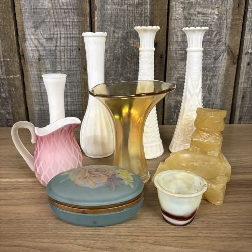 An Assortment of Vintage Art Glass, Milk Glass, and Carved Stone Items: This collection features several pieces of mid-century decorative glass and carved stone. Included is a pink satin glass pitcher with a diamond quilted mother of pearl pattern, a white cased interior,