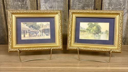 A Pair of Framed Prints Attributed to Edward H. Walker: This pair of framed works features two art reproductions after watercolor paintings by Edward H. Walker. The first image portrays a river landscape featuring a rowboat with two figures and a distant v