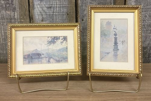 A Pair of Paul Sawyier Art Prints, Covered Bridge and Wapping Street Reflections: This pair of art prints, after watercolor originals by American Impressionist artist Paul Sawyier (1865–1917), depicts atmospheric scenes of Frankfort, Kentucky. The horizontal print is titled Cover