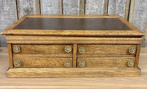 Victorian Quartersawn Oak Tabletop Clerk's Desk with Four Drawers: This is a Victorian era quartersawn oak tabletop clerk's desk or country store countertop organizer dating to the late 19th or early 20th century. The chest is constructed from quartersawn white oak, 