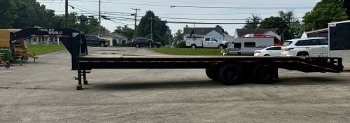 2022 Trailer World Model GH830MST Gooseneck Flatbed Trailer: This is a 2022 gooseneck flatbed trailer manufactured by Trailer World Acquisition Company, LLC, in Ozark, Alabama. The unit is model GH830MST and features a tandem dual-wheel axle configuration. The 