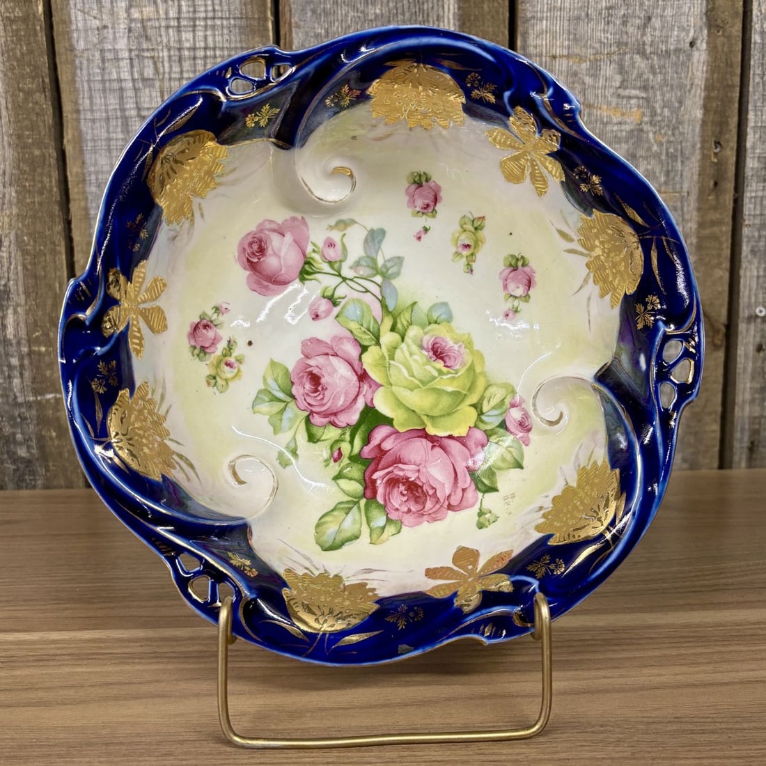 Oscar Schlegelmilch IPF Germany Cobalt Blue and Gilded Porcelain Rose Bowl: A large circular porcelain bowl manufactured by the Oscar Schlegelmilch factory in Neinstedt, Germany, featuring the International Porcelain Factory (IPF) mark used for the export market. The vessel i