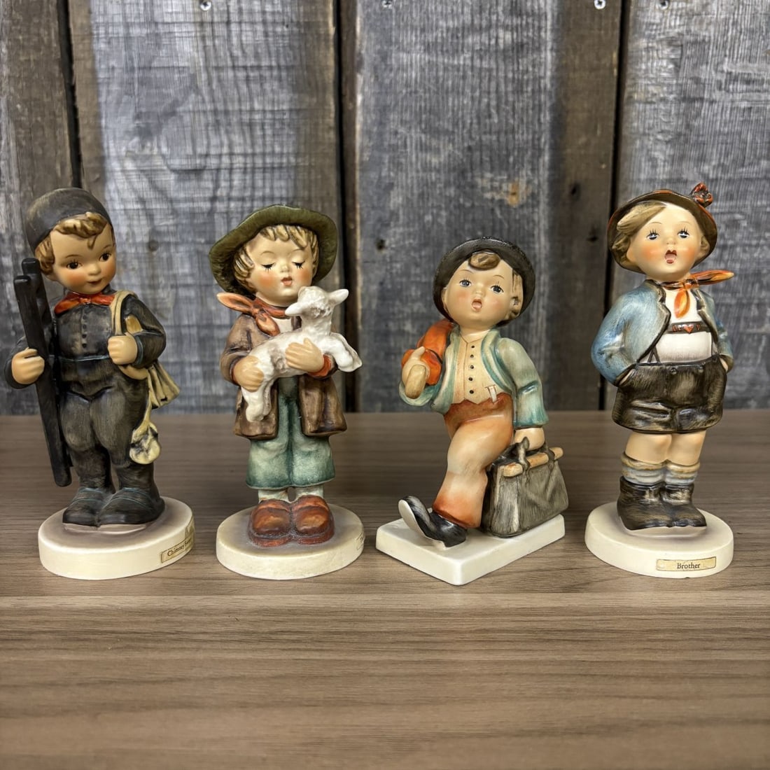 Set of Four Goebel Hummel Hand-Painted Porcelain Figurines (1 of 10)