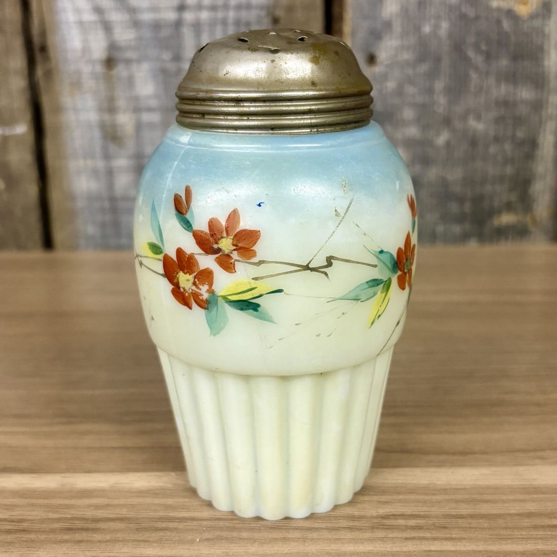 Gillinder and Sons Six Rib Melon Opalware Satin Glass Sugar Shaker: A late 19th-century opalware sugar shaker, also referred to as a muffineer, manufactured by Gillinder and Sons. The vessel is crafted from opaque glass with a matte satin finish, featuring a six-rib o