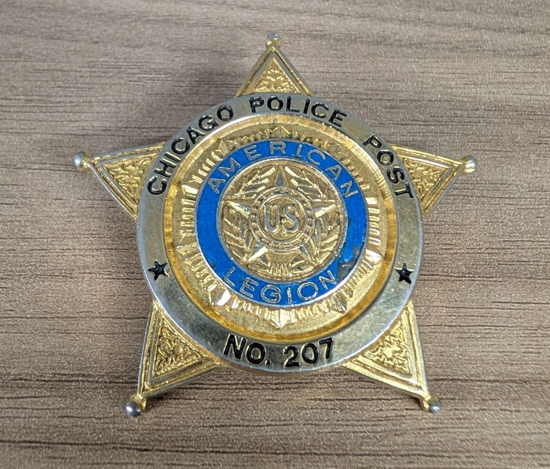 Chicago Police American Legion Post 207 Star Membership Badge: An American Legion membership badge produced for Chicago Police Post No. 207. The badge is designed in the shape of a five-pointed star with ball-tipped points, a style historically associated with th